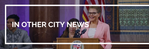 Mayor Karen Bass speaking at a podium