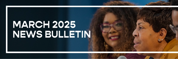 March 2025 News Bulletin, image: photo of two women with one speaking into a microphone